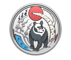 The reverse side of a Canadian silver coin showing an Indigenous style bear standing near a birch tree under a red sun