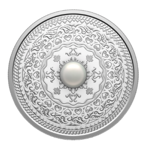 A silver collector coin featuring a traditional Filipino-inspired pattern and a central white pearl