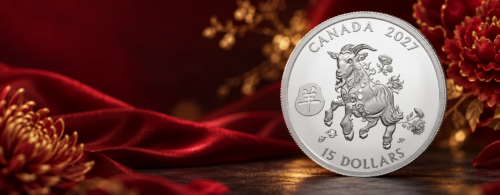 A Canadian 2027 Year of the Goat silver coin displayed on a wooden surface against rich red silk and golden floral accents