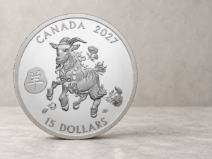 A 2027 Canadian 15-dollar silver commemorative coin featuring an engraved stylized goat and Chinese character standing on a stone surface